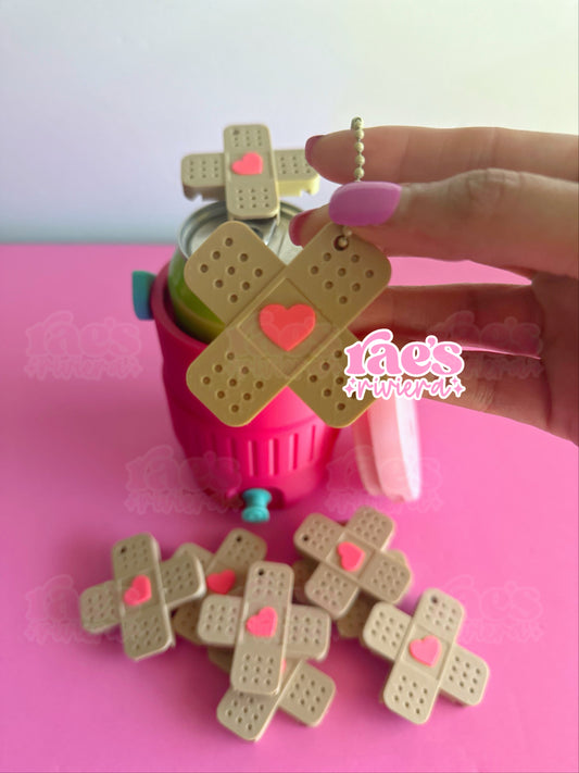Band Aid Can Opener Keychain Cover